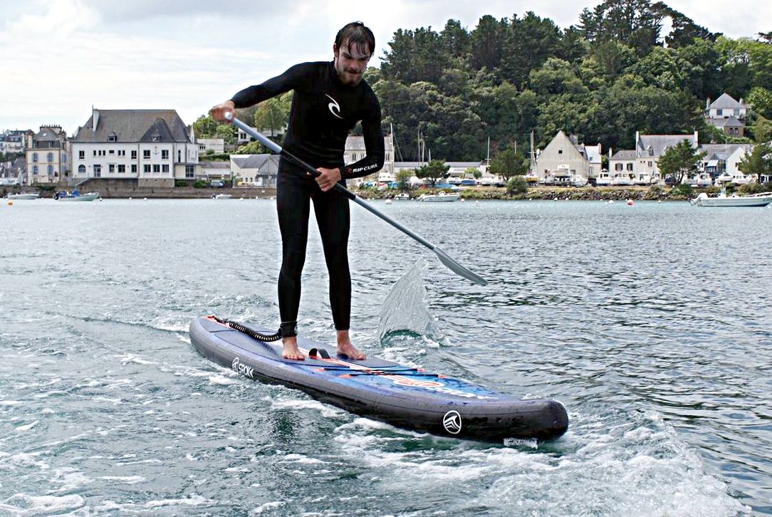 Trip at sea on a stand-up paddleboard